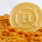 HORATII logo on Honey Cake